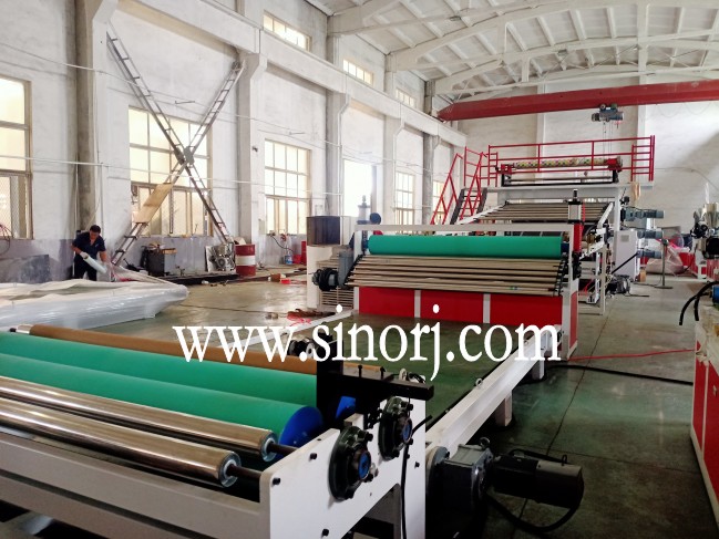 仿大理石板生產(chǎn)線，地板革生產(chǎn)線，三輥四輥集裝箱發(fā)貨中